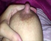 Close up of Latina squeezing milk from her big boob from squeezing milk li