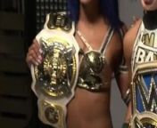 WWE - Sasha Banks and Bayley posing with the Tag Team titles from sasha bank hot