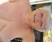Pool side nude boob and pussy play from granny sunbathing