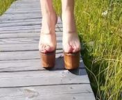 Lady L walking wooden sexy mules. from nudist nature walk