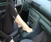 Beautiful feet in a car from feet in a