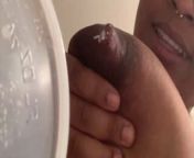 Busty black Youtuber fills cup with chocolate milk from youtuber mom lactating