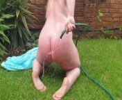 Big fat busty girl enjoying a naked hosepipe masturbation in the garden from garden hose